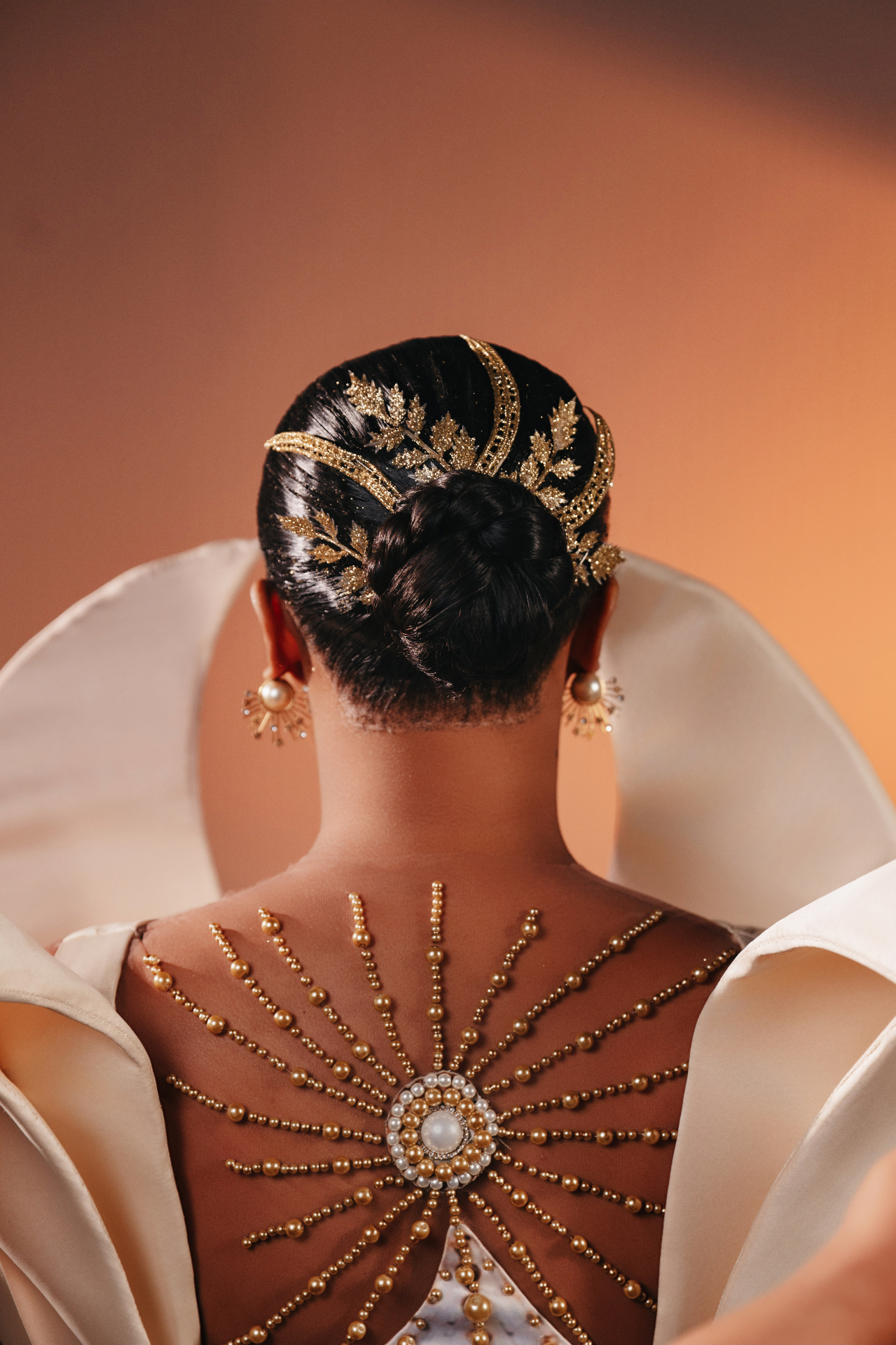 Nolanga Made atelier — ivory silhouette